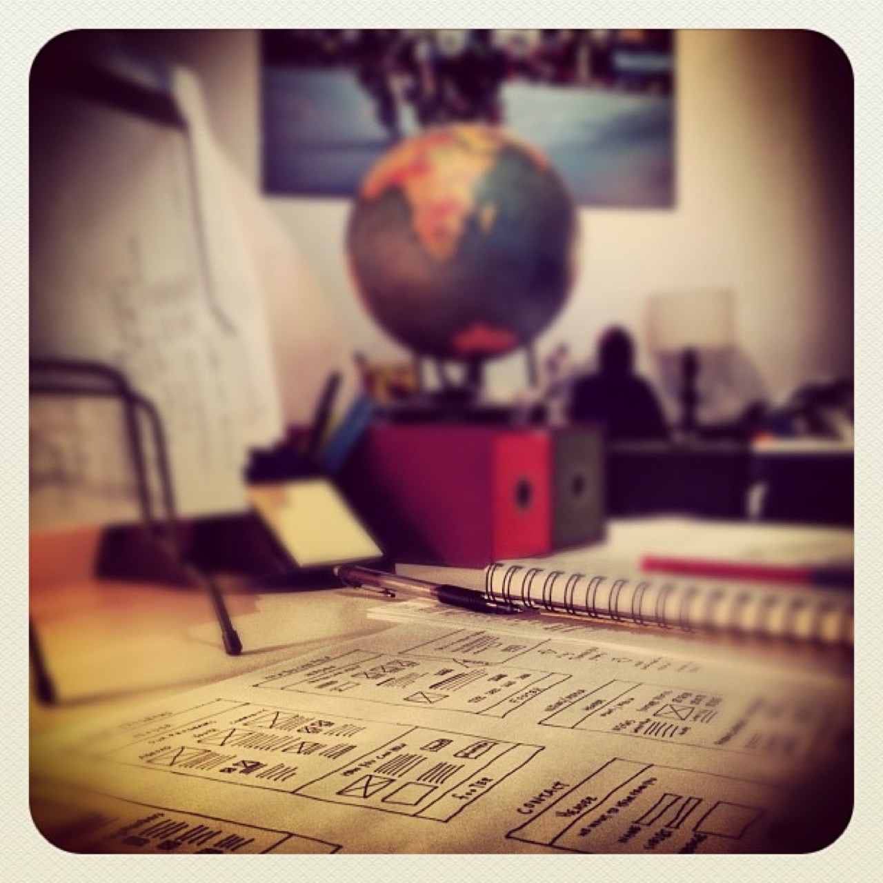 Wireframe sketches on the desk