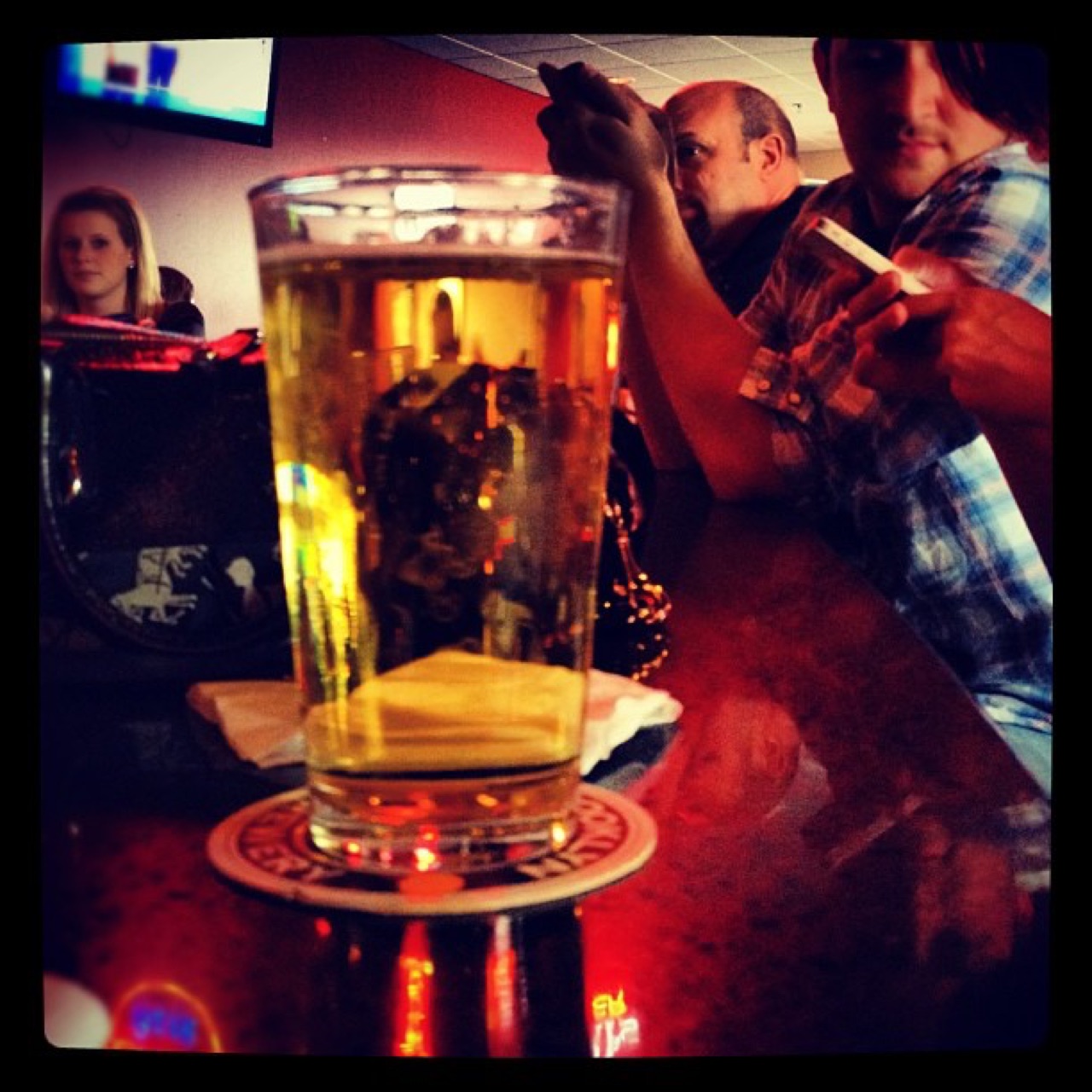 A pint at the bar