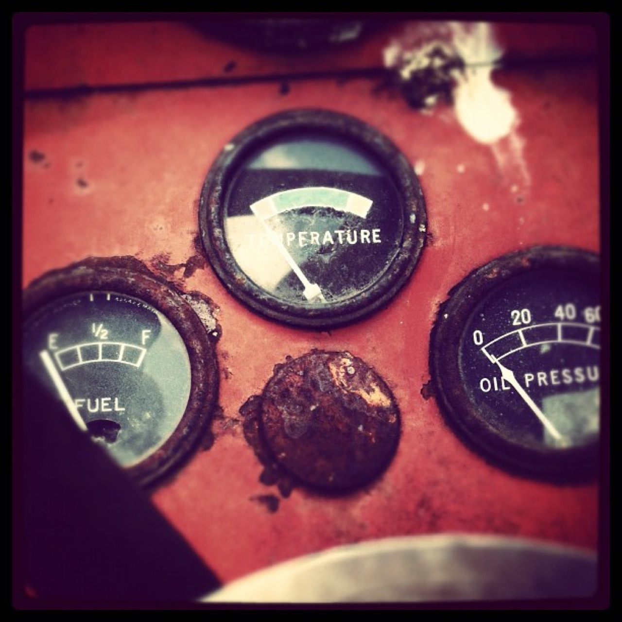 Gauges on an old tractor dash