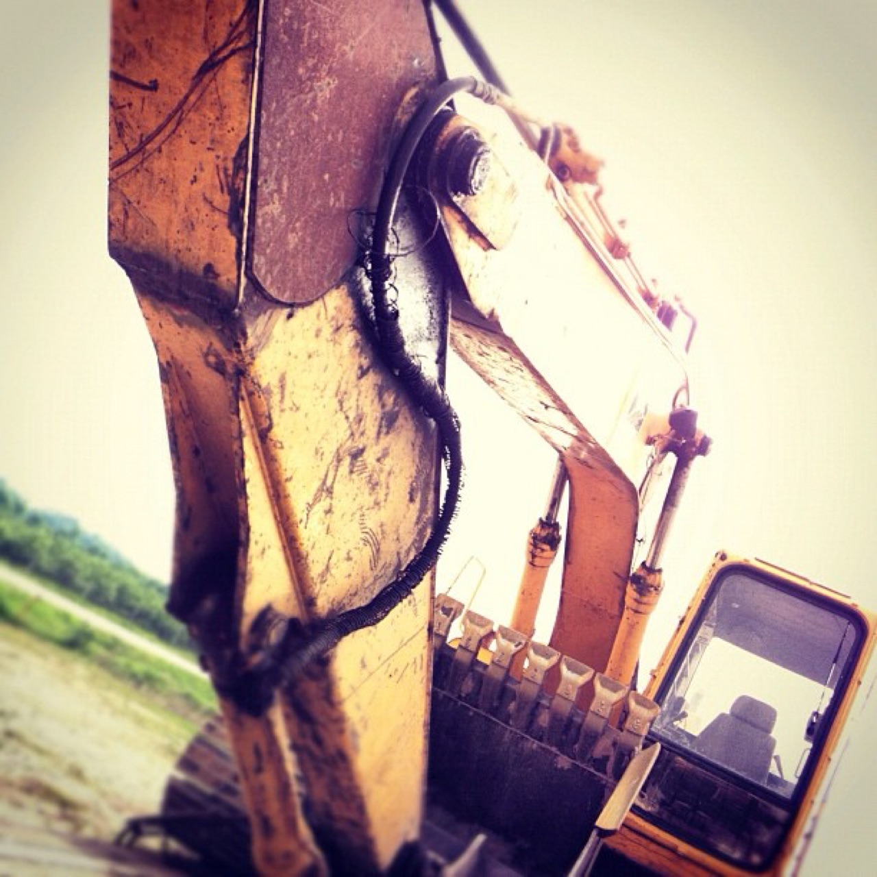 Looking up the excavator arm