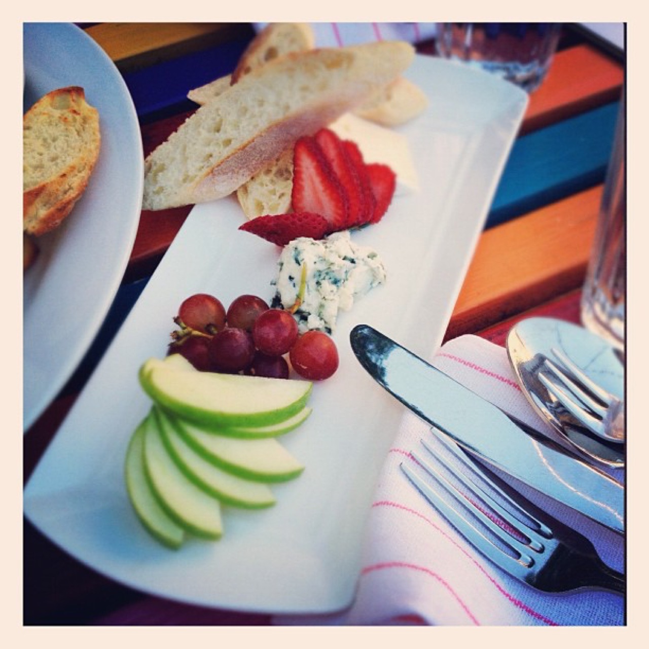 Cheese plate on a painted patio table
