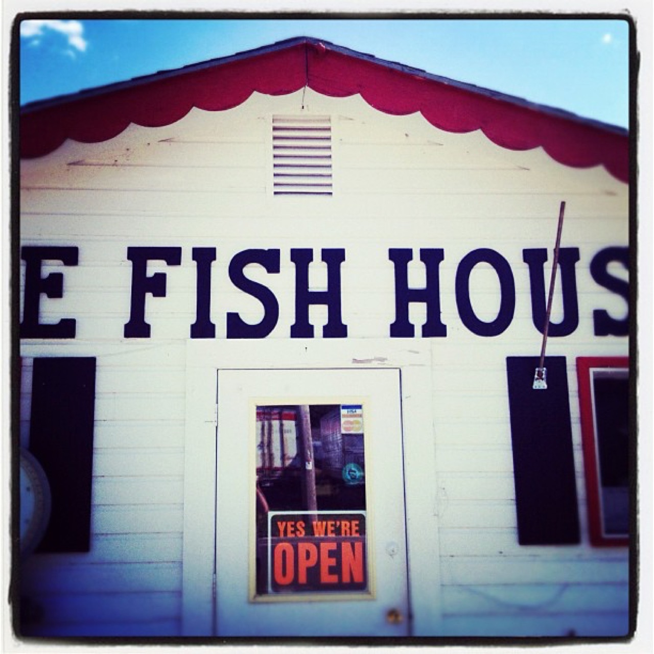 Fish house with the open sign out