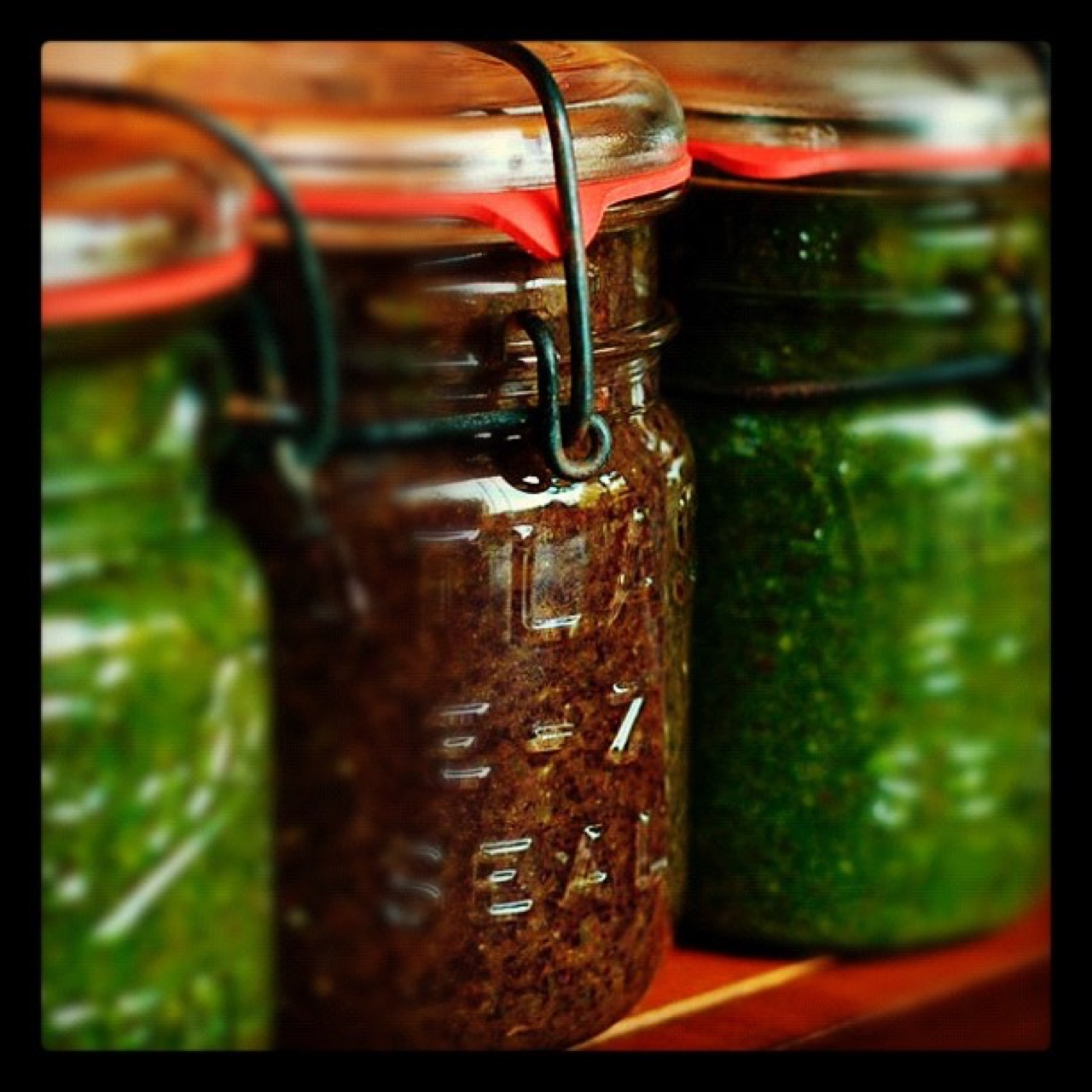 Pesto and tapenade in old canning jars