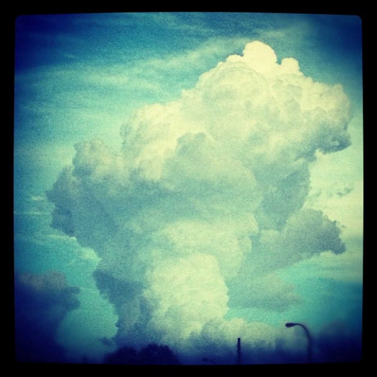 Thunderhead towering over the streetlights