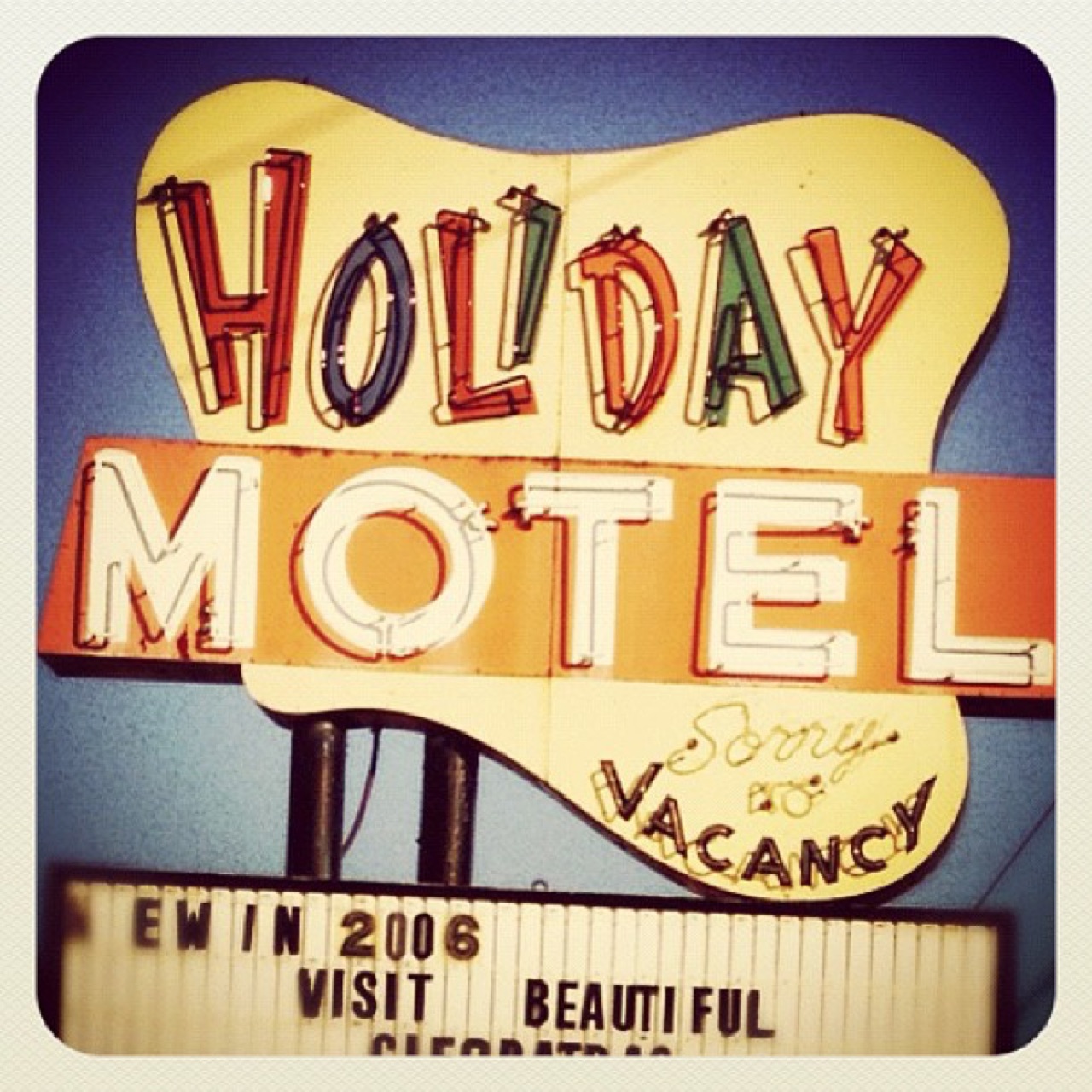 Holiday Motel sign, sorry, no vacancy