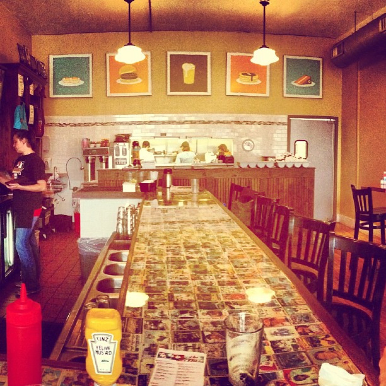 Diner counter tiled with old trading cards
