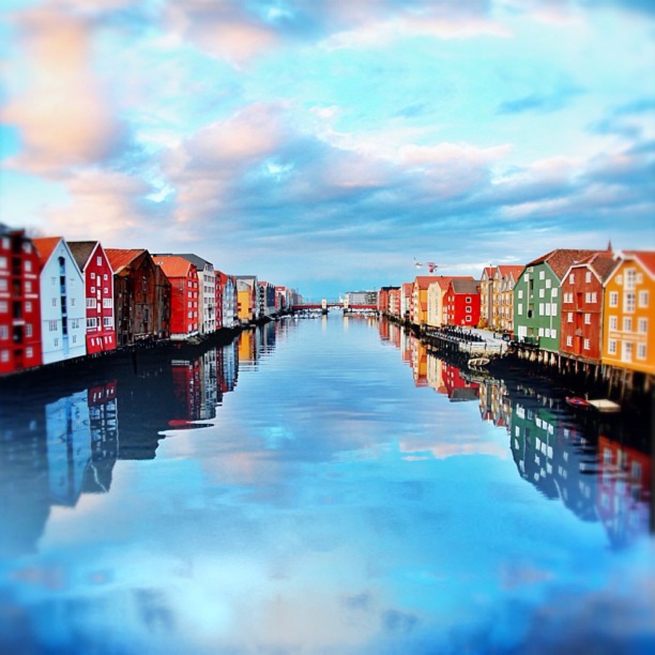 Trondheim wharf houses mirrored in still water