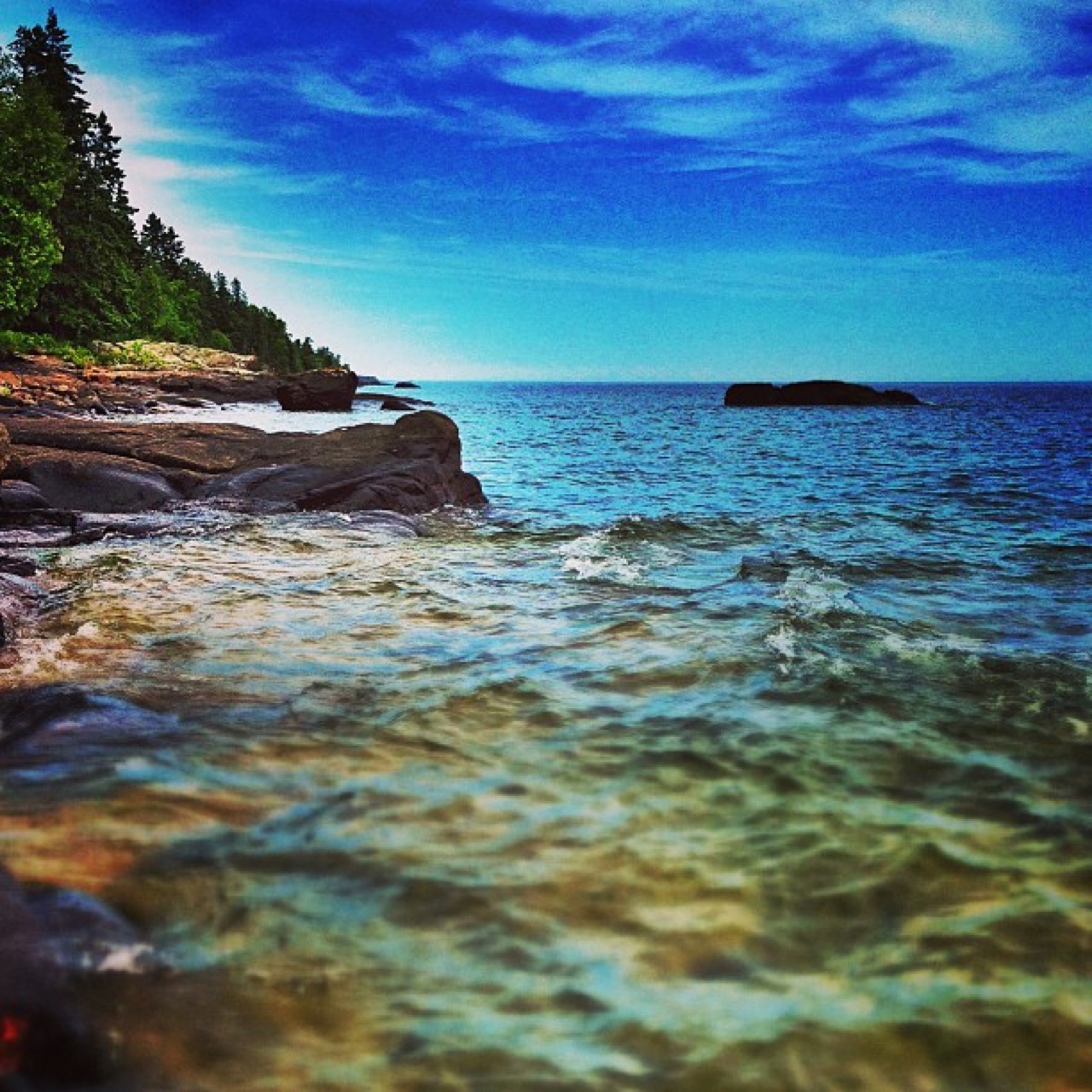 "By the shores of Gitchee Gumee, By the shining Big-Sea-Water"…