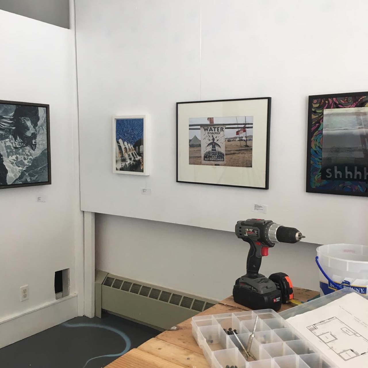 Starting to get artwork hung for the Second Annual Art of Water.