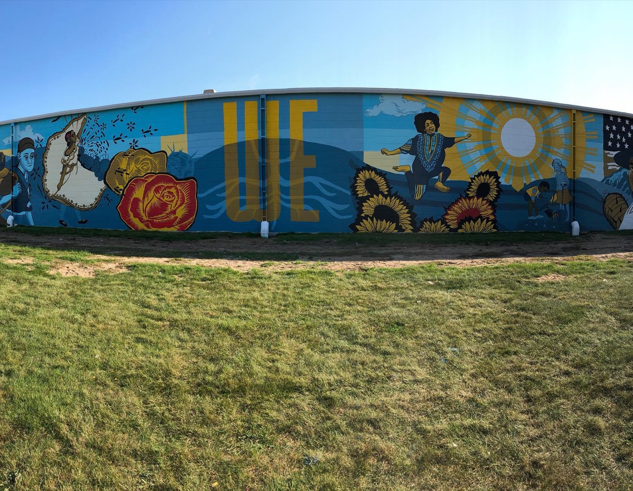 The Art Slam 2020 CommUNITY Mural is complete!