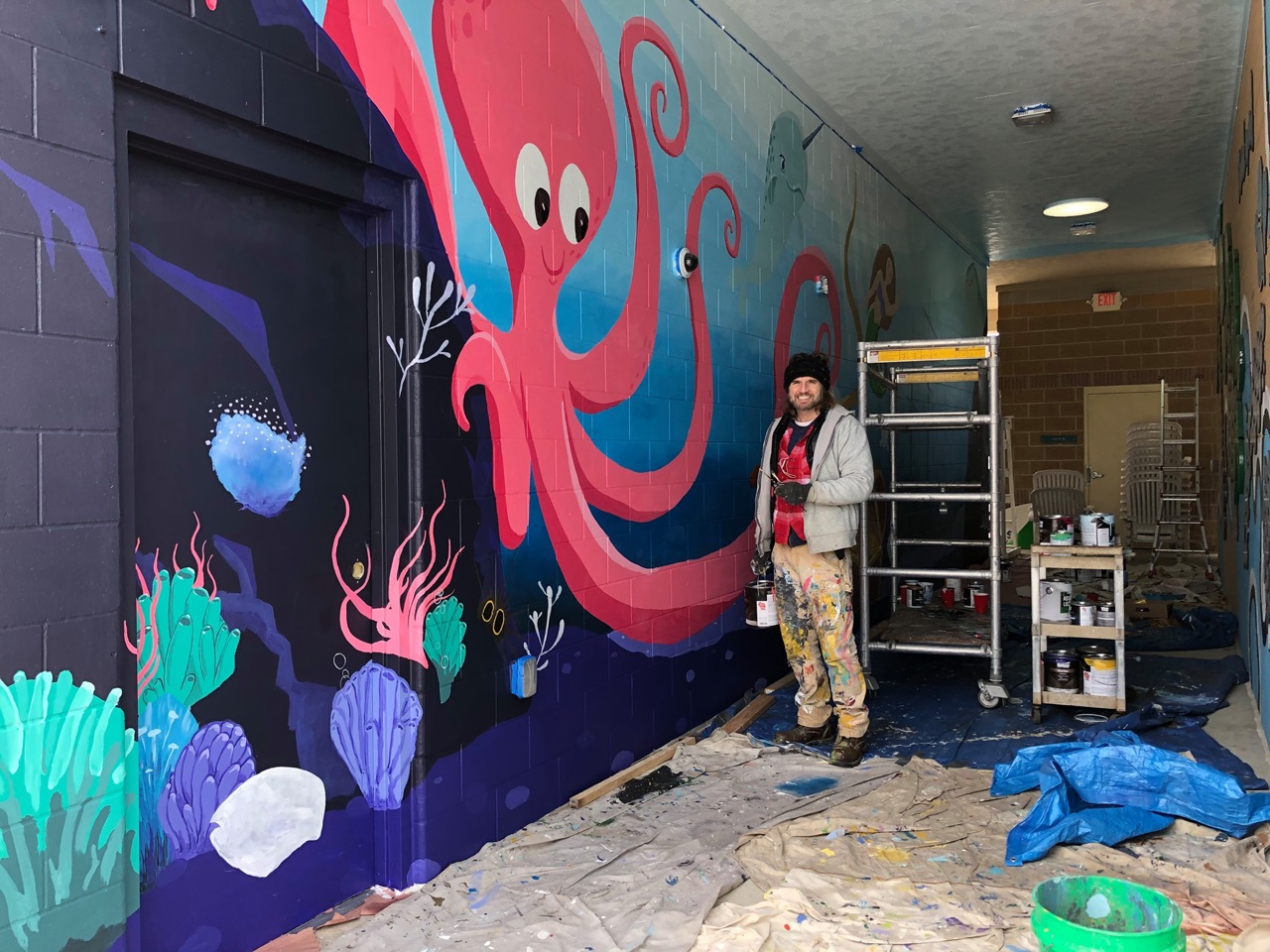 A Don’s imagination-filled hallway getting painted @ the Aquatic Center!