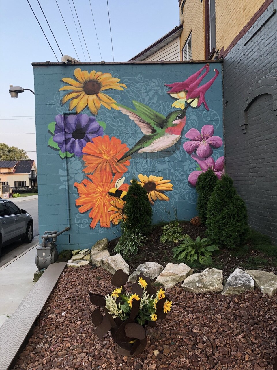 We've been putzing on this pretty little pocket mural all summer and…