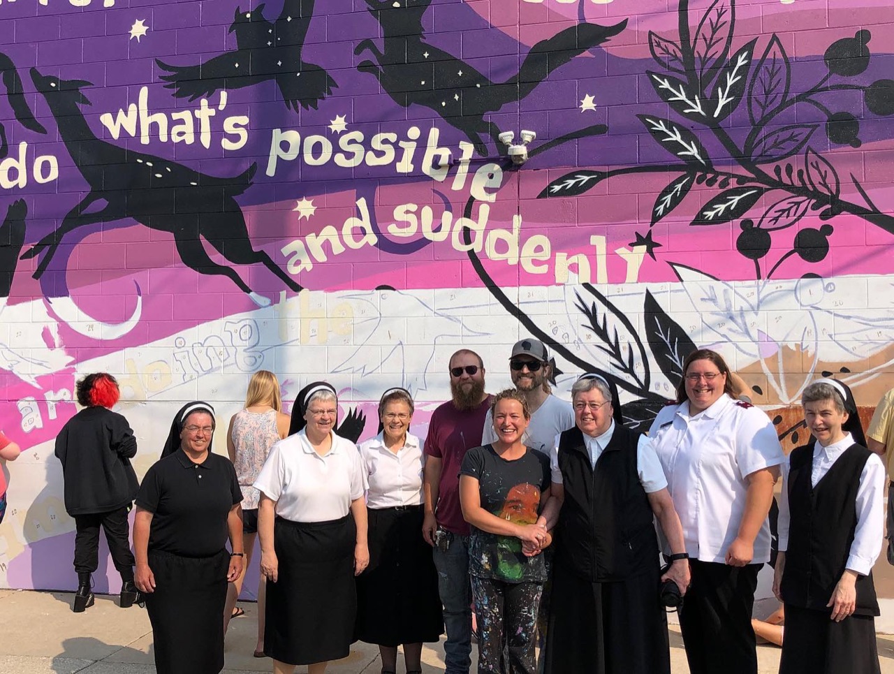 The community residents of Manitowoc showed up to paint a mural…
