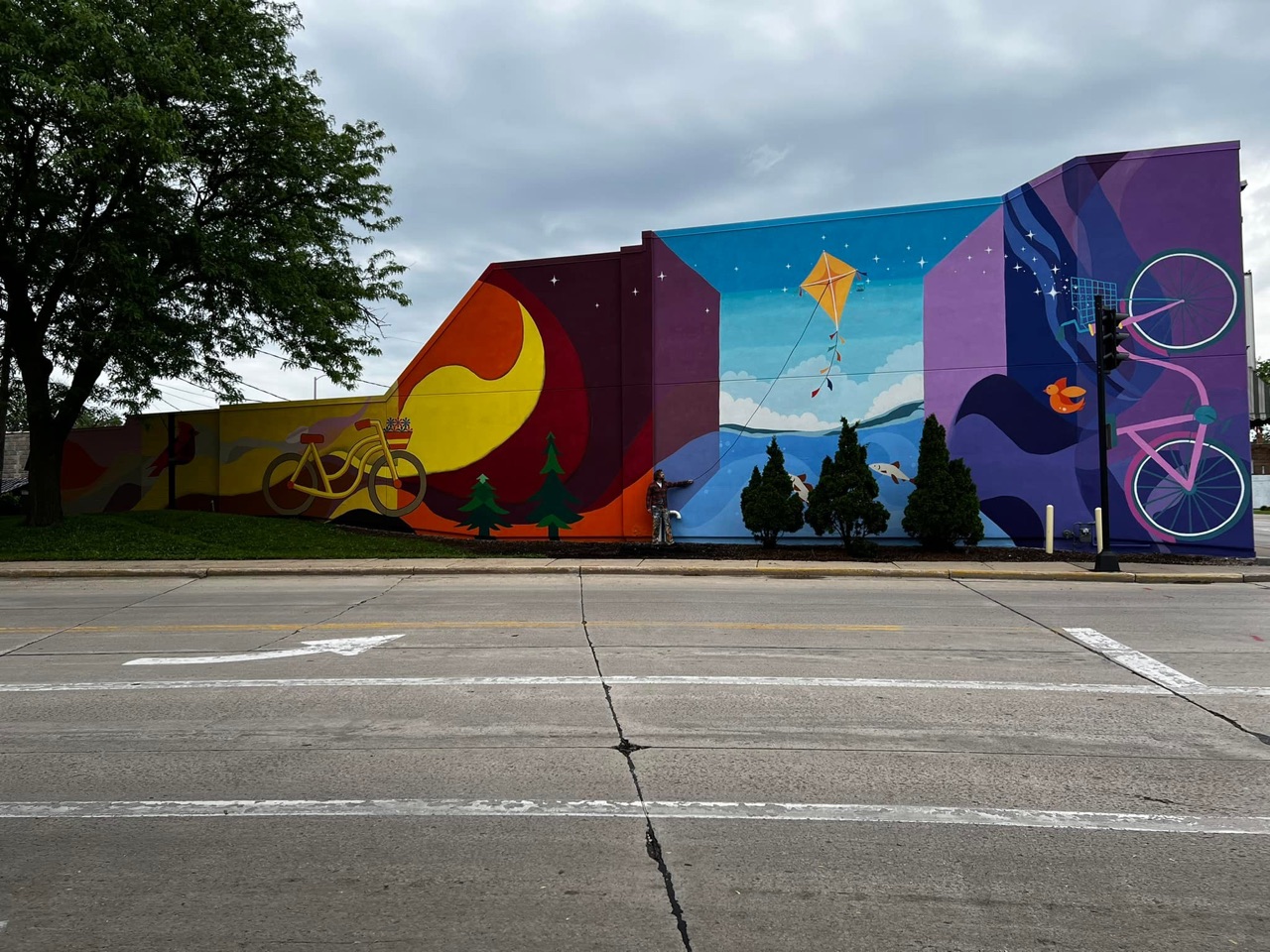 A regular passerby during the process of this mural smiled and said…