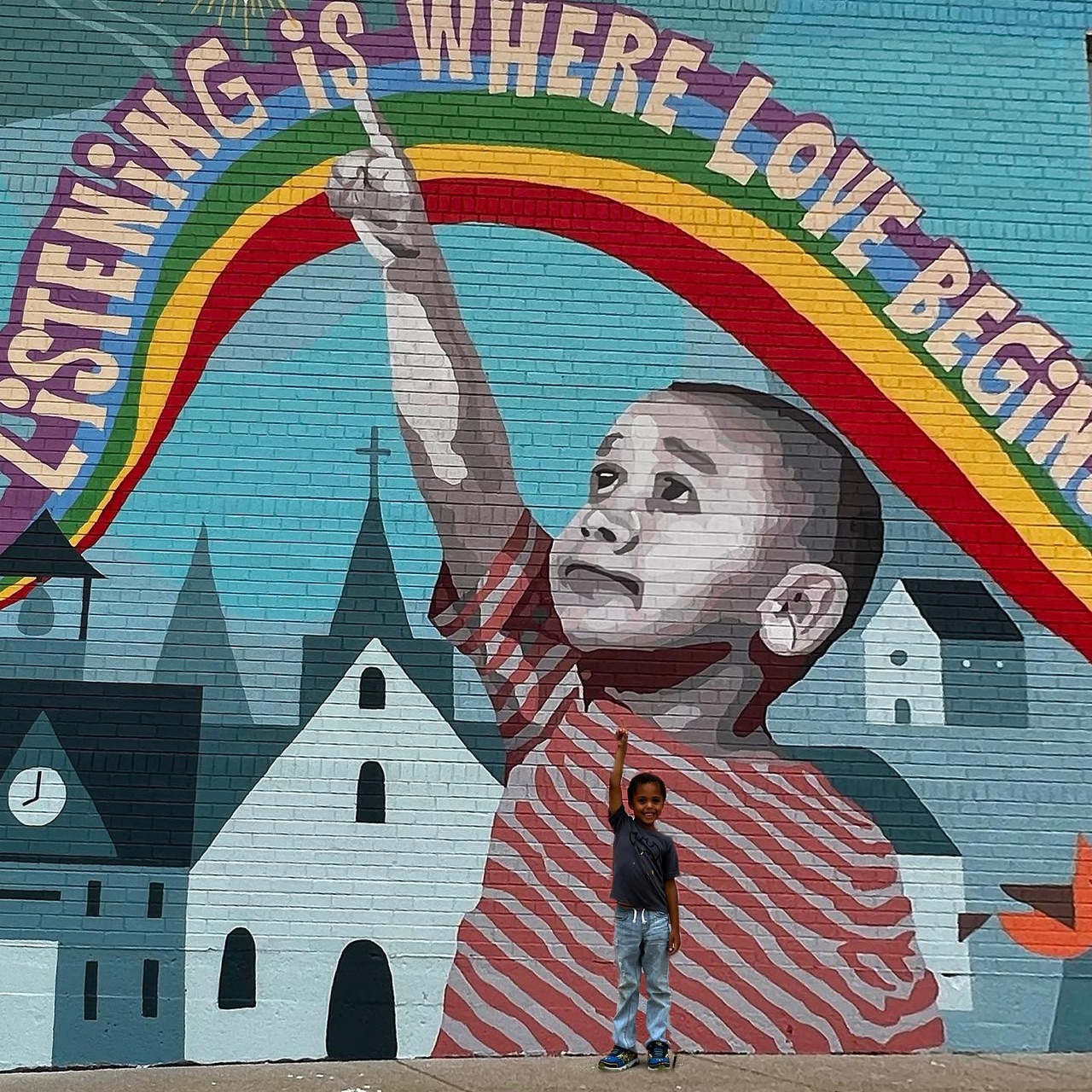 It was beautiful day in the neighborhood as we completed this mural…