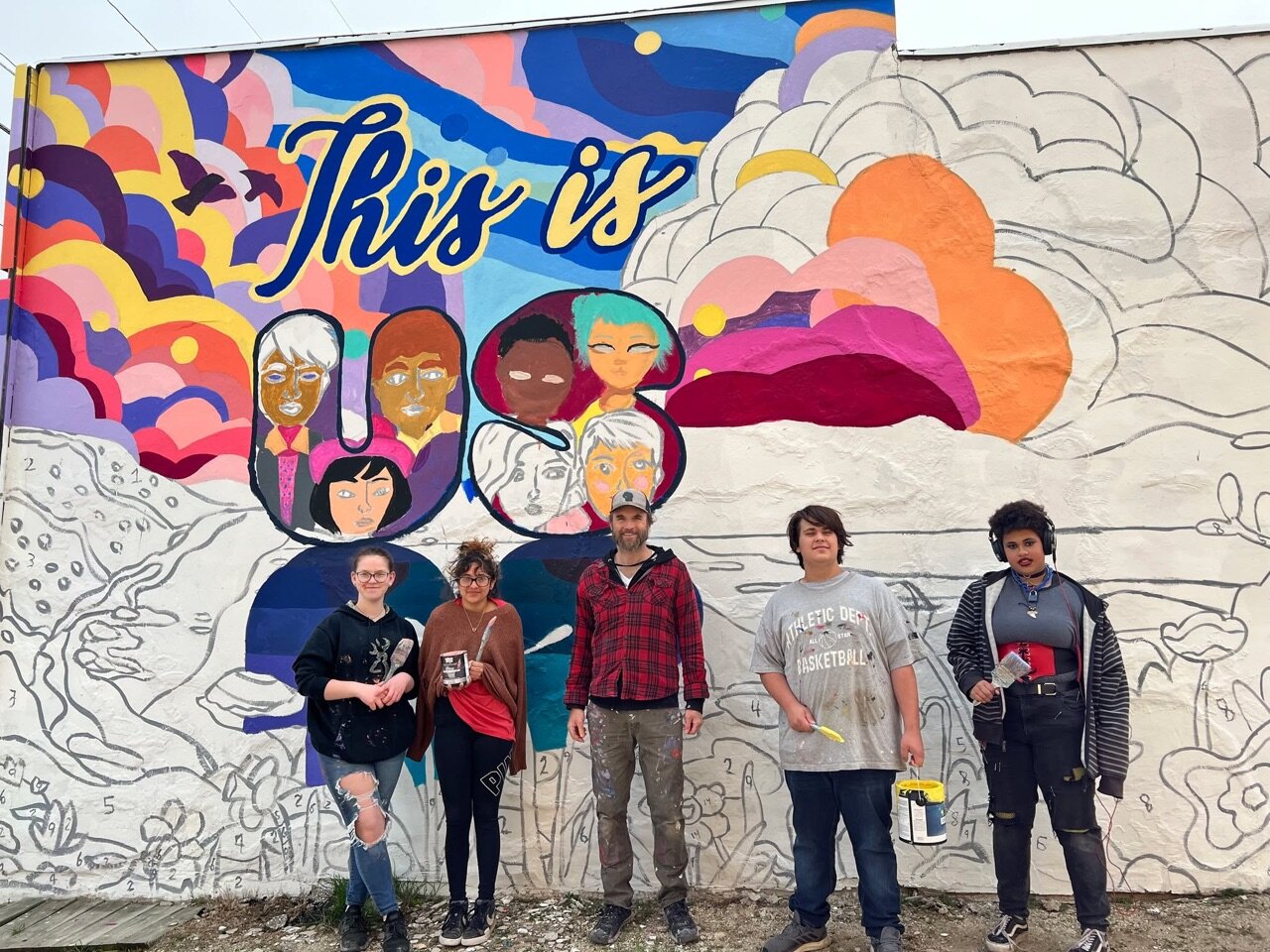 We can see our latest mural from our backyard!