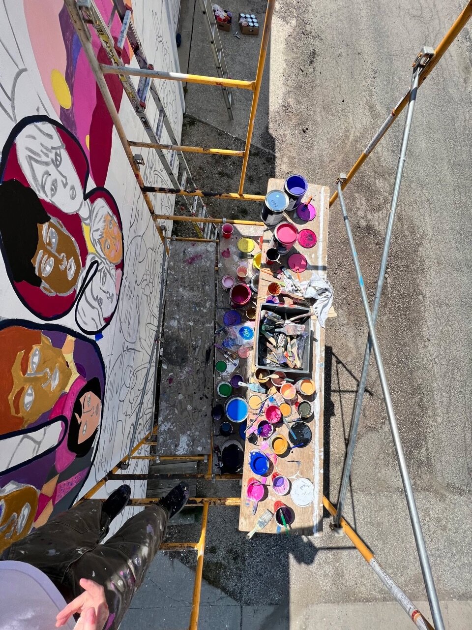 We can see our latest mural from our backyard!
