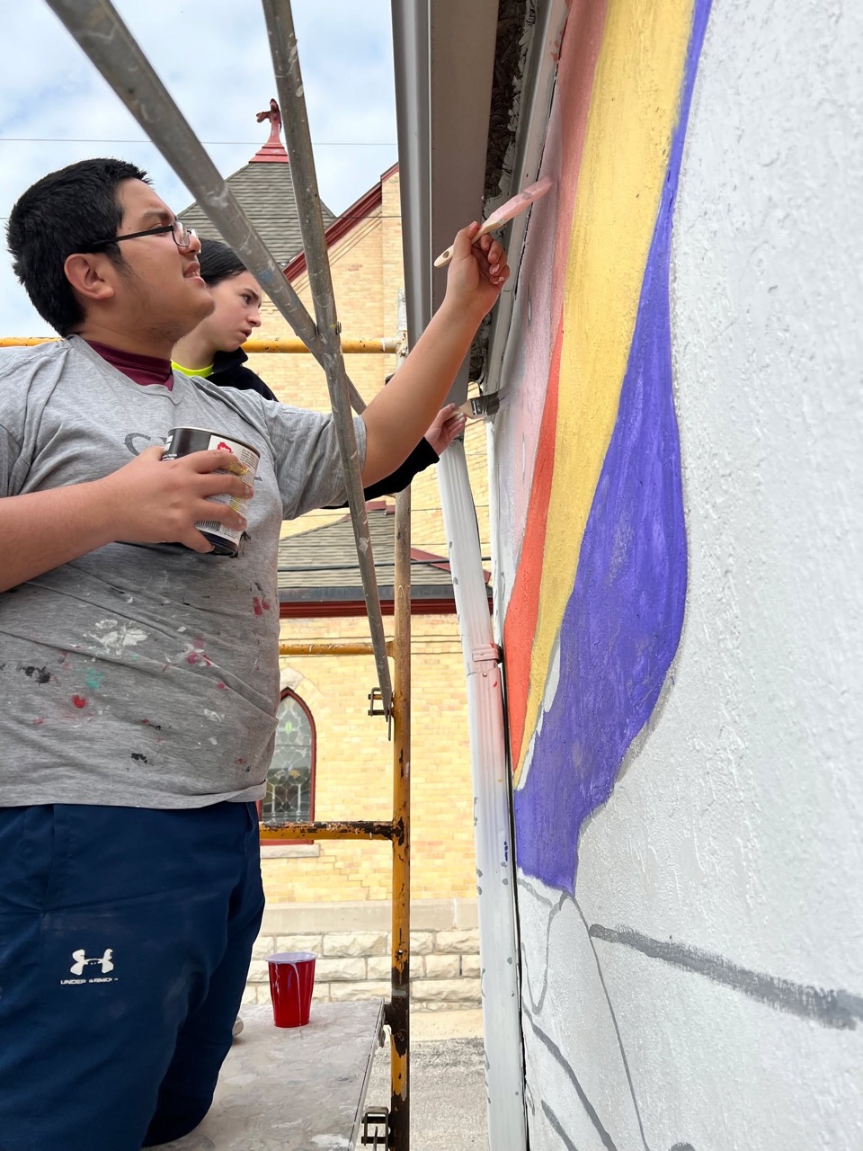 We can see our latest mural from our backyard!