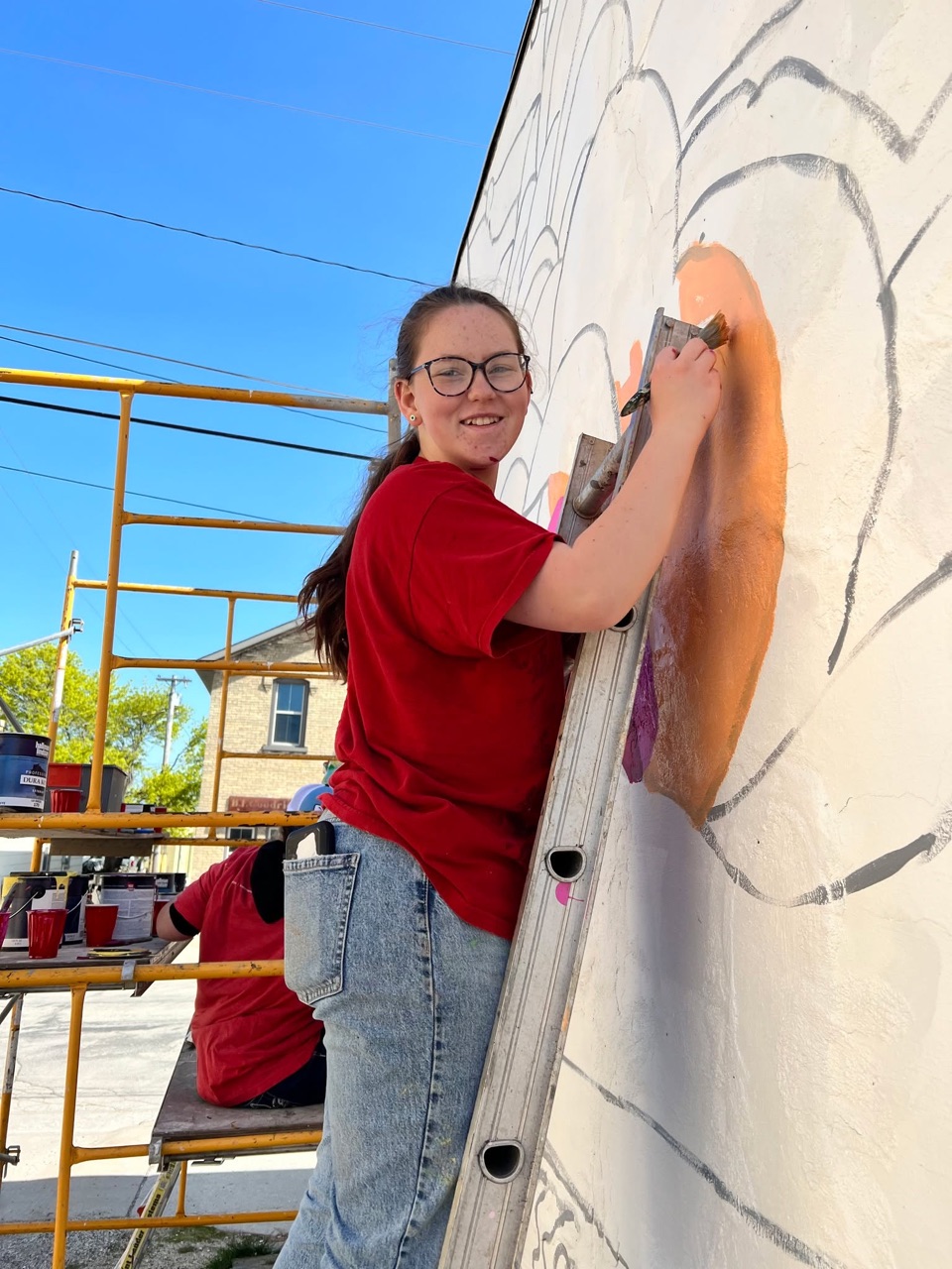 We can see our latest mural from our backyard!