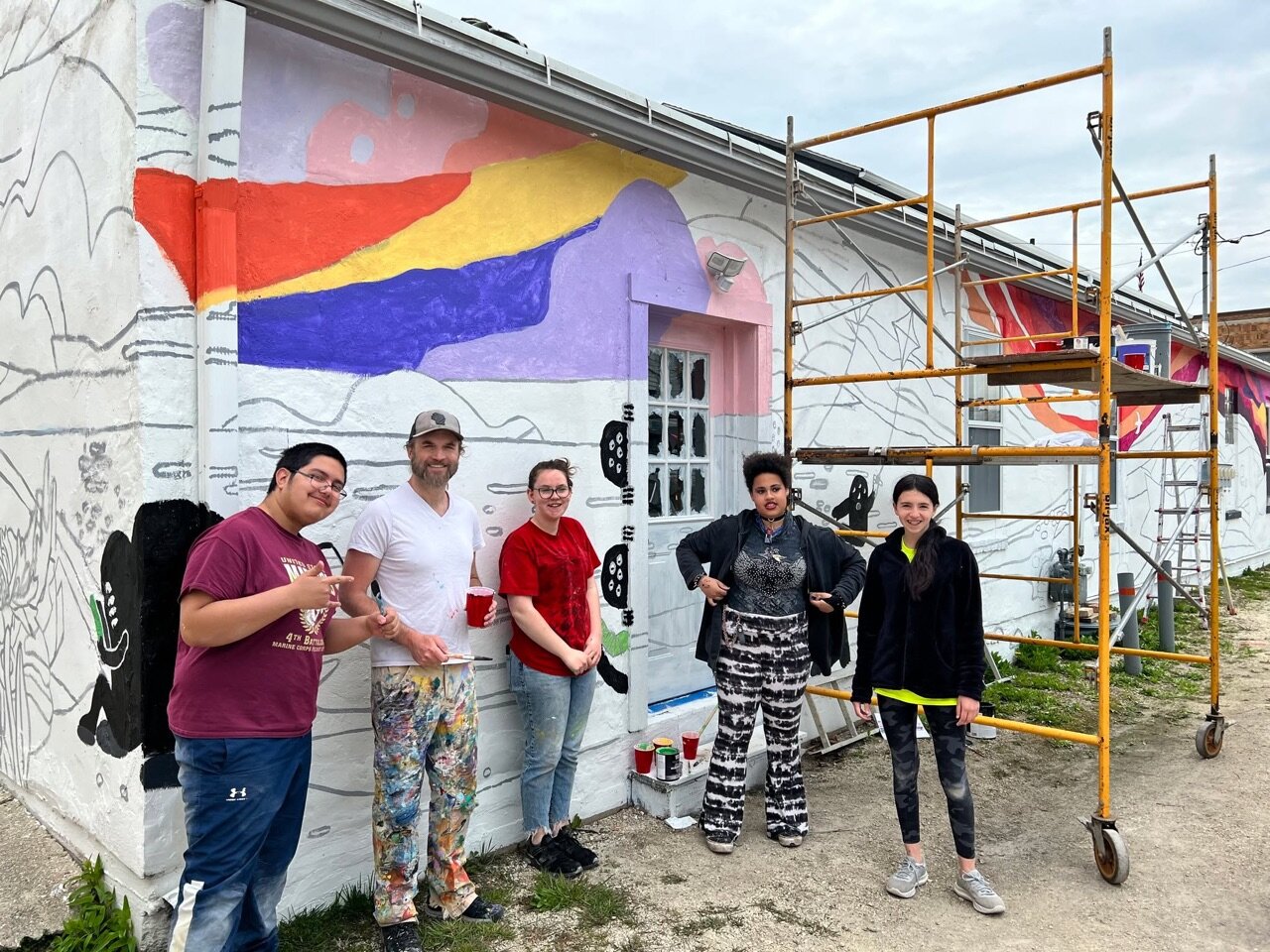 We can see our latest mural from our backyard!