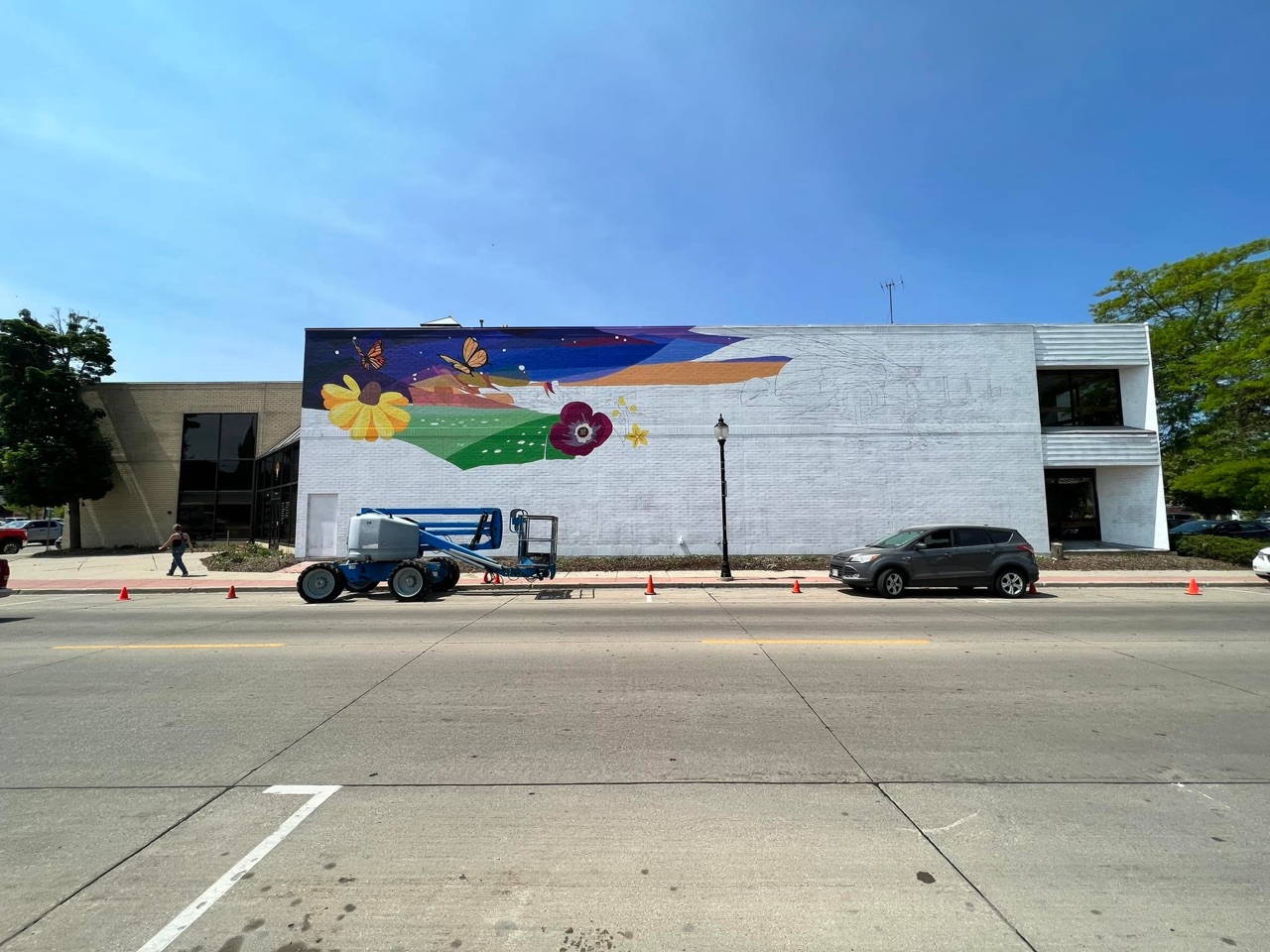 We’re going to need a lot of taco breaks to paint this huge wall🌮🎨☀️.