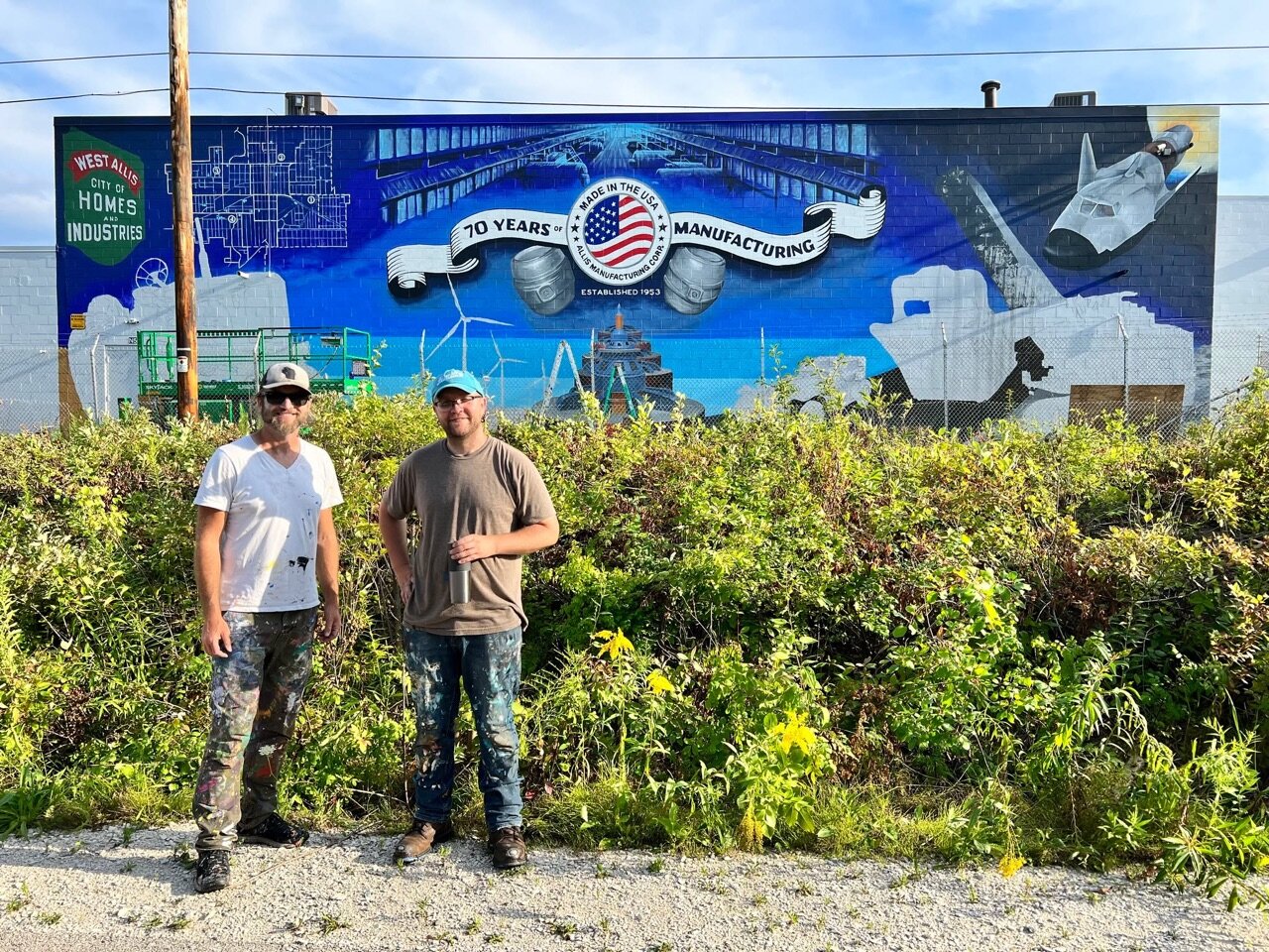 These two have been busting out this big mural celebrating the industry…