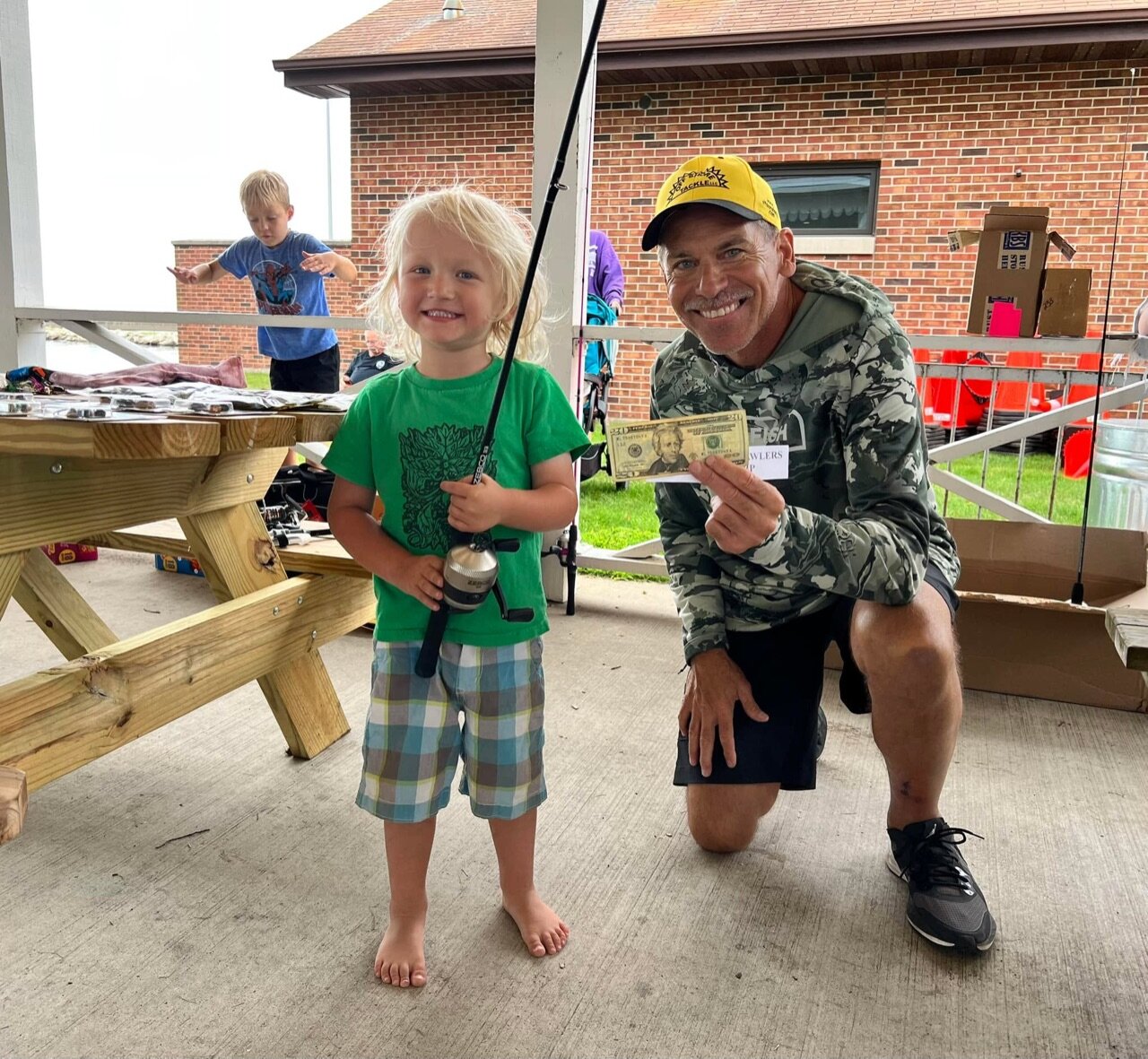 Arthur caught his first fish and won a fishing pole in the 2023 Shanty…