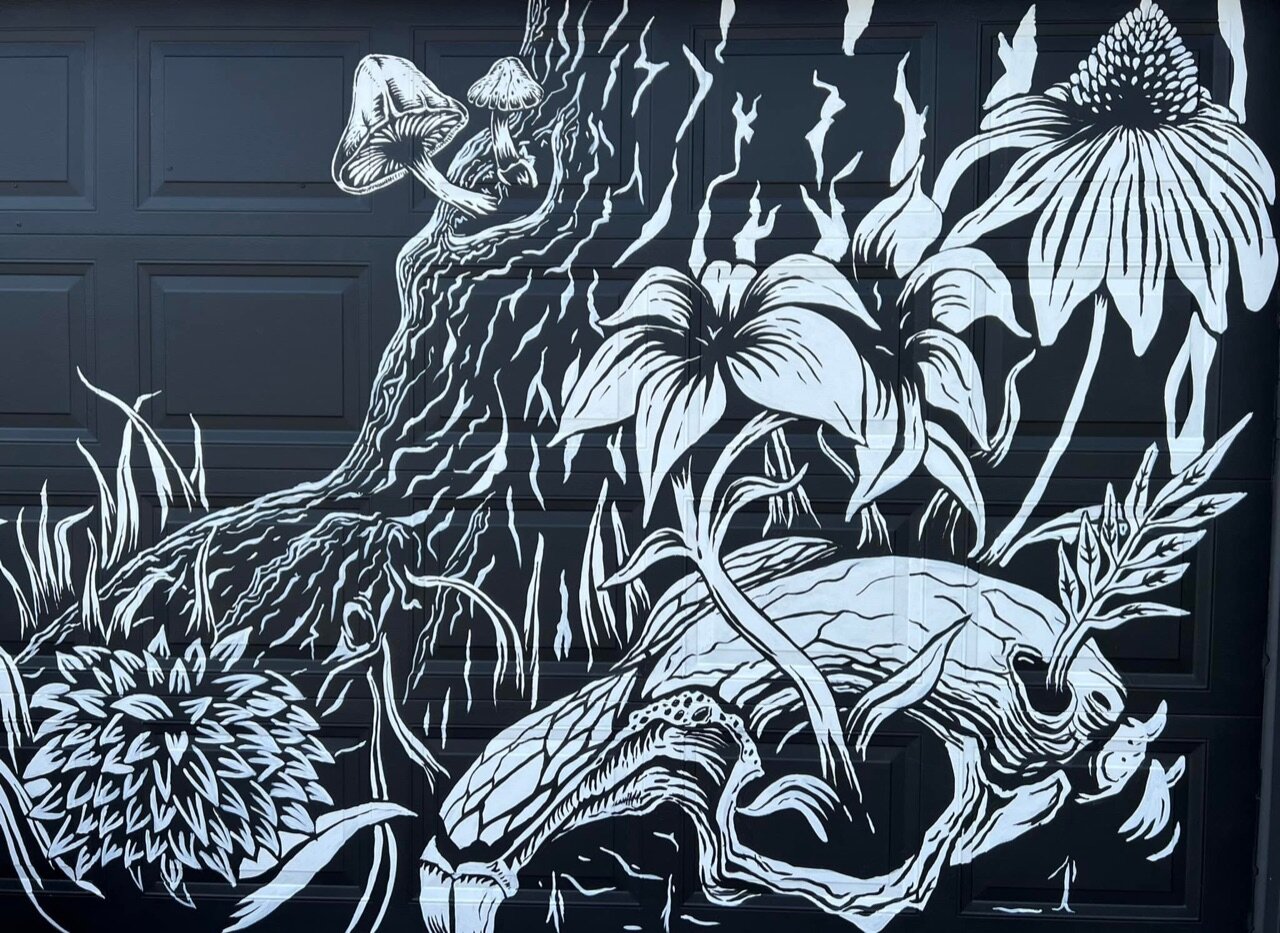 We made a new friend who let us paint cool stuff on her garage door.