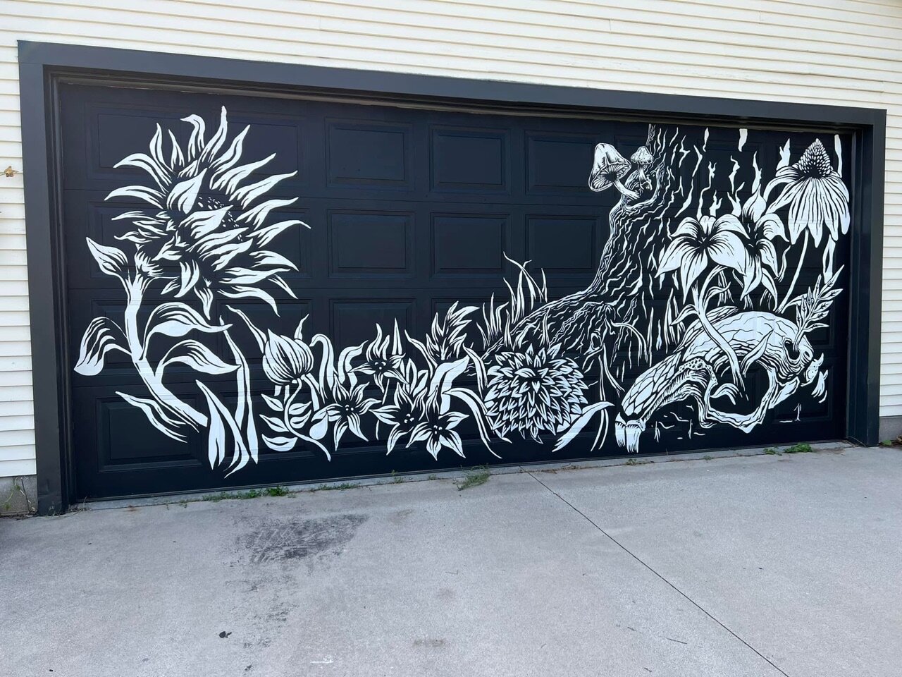 We made a new friend who let us paint cool stuff on her garage door.