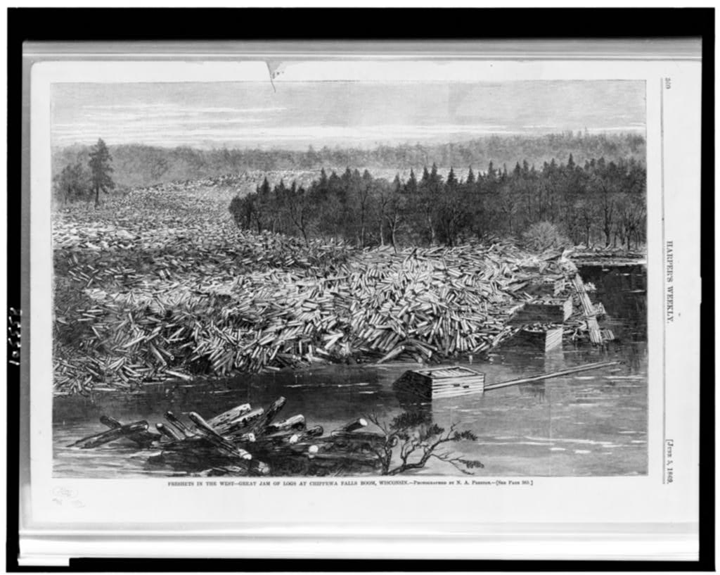 1869 engraving of a massive log jam burying a Wisconsin river in white pine from bank to bank